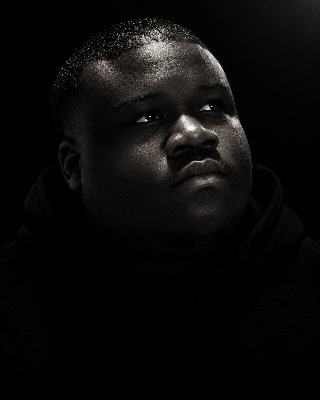 Ed, the photographer and filmmaker behind Flicks by Ed Media, in a black-and-white portrait